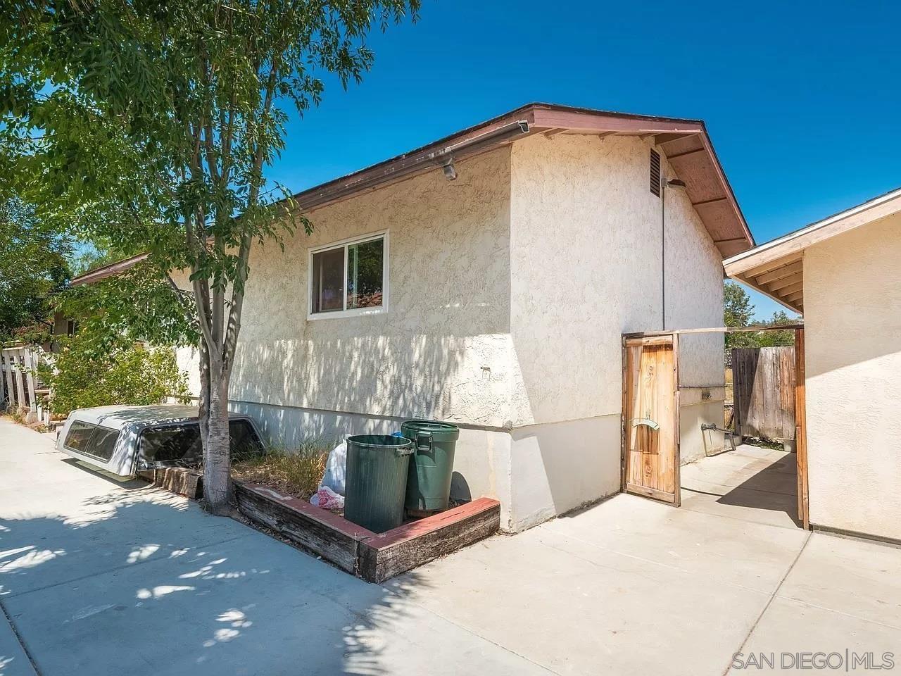 2356 Central Spring Valley Spring Valley, CA 91977 - Photo 6 of 16 a front view of a house with a yard