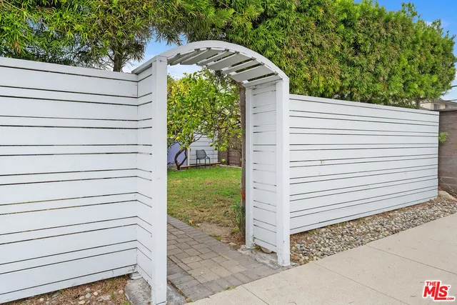 a view of a backyard with a garden