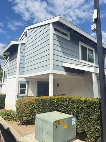 a front view of a house with garage