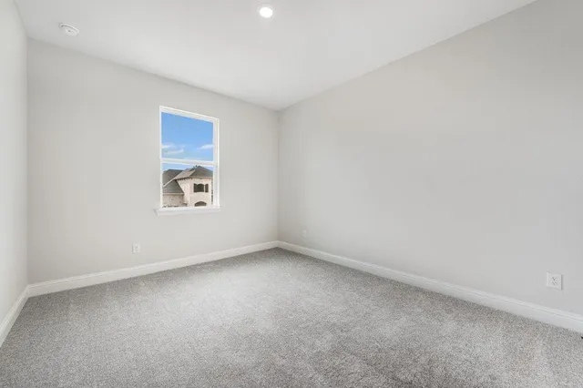 a bathroom with a sink a toilet a mirror and vanity