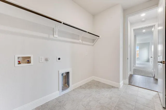 a view of a lake with houses in the back