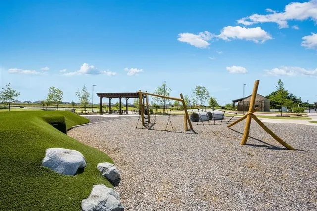 a room with gym equipment and a window
