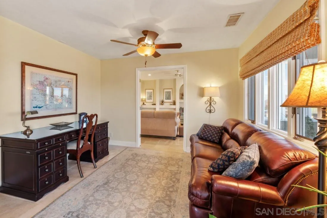 16033 Stoney Acres Road Poway, CA 92064 - Photo 18 of 60 a living room with furniture and a flat screen tv