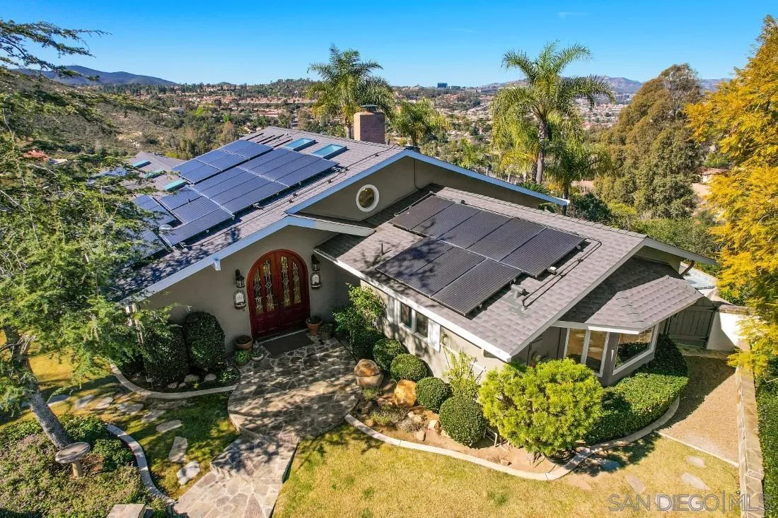 16033 Stoney Acres Road Poway, CA 92064 - Photo 2 of 60 a view of a house with a yard