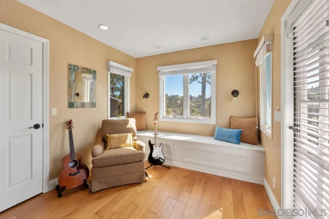 16033 Stoney Acres Road Poway, CA 92064 - Photo 28 of 60 a living room with furniture and a large window