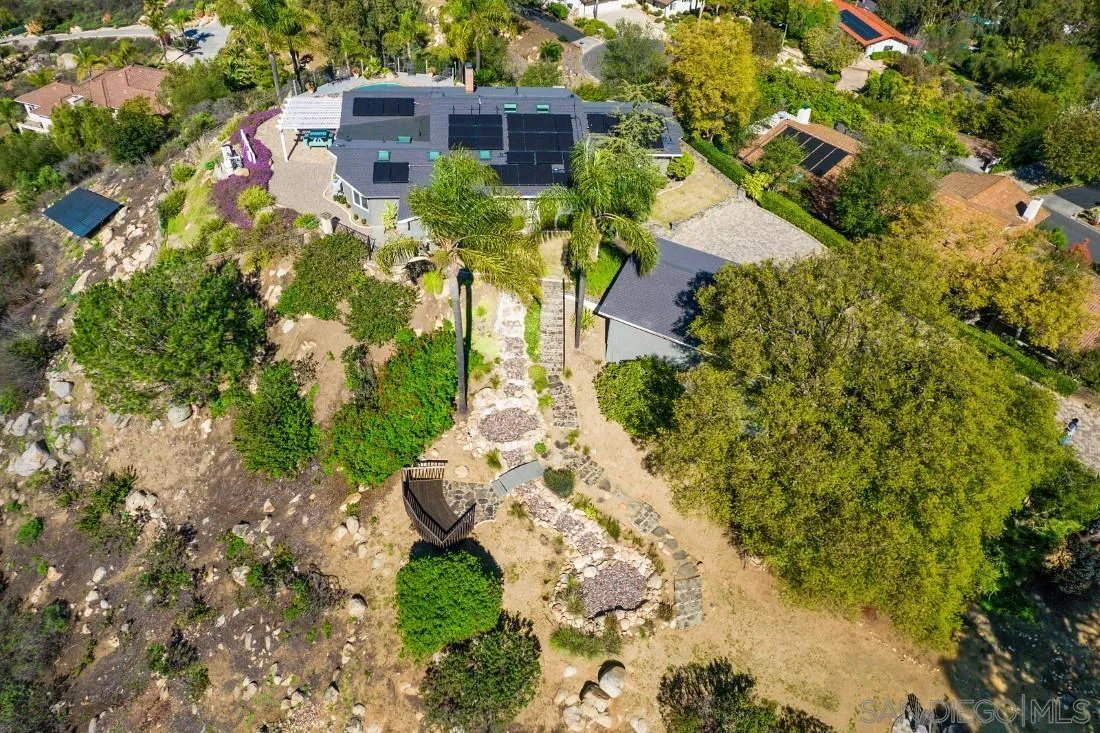 16033 Stoney Acres Road Poway, CA 92064 - Photo 6 of 60 an aerial view of a house with a yard and large trees