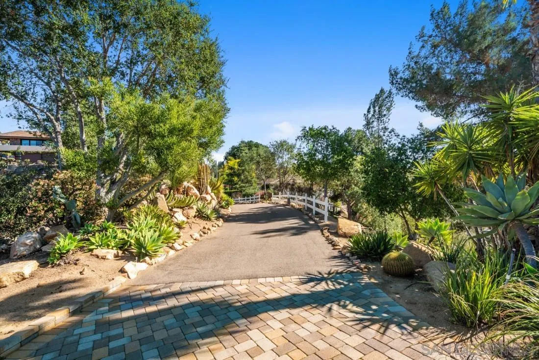 16033 Stoney Acres Road Poway, CA 92064 - Photo 7 of 60 a view of a street with some trees