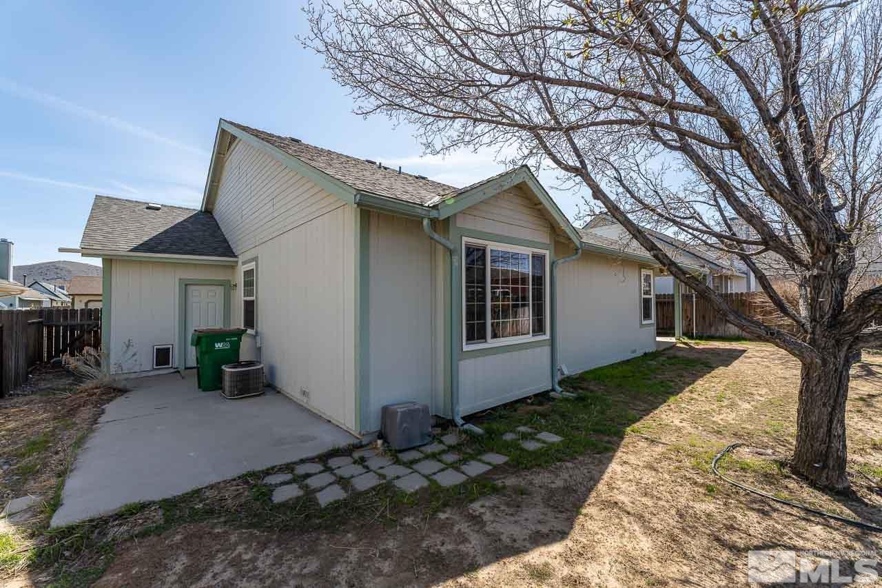 254 Windtree Circle Carson City, NV 89701 - Photo 22 of 23 a front view of house with yard