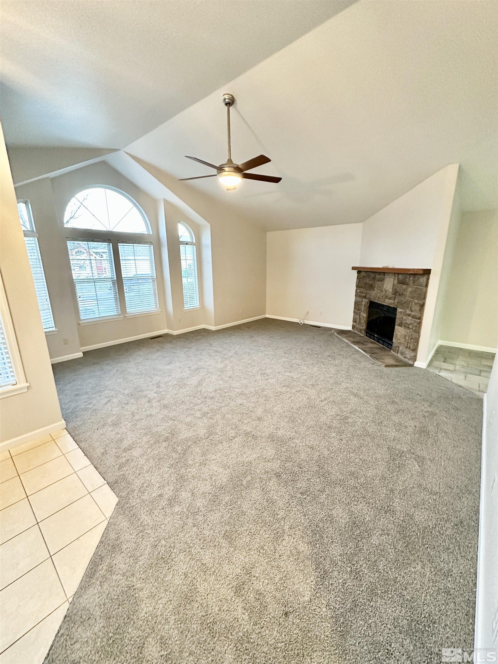 254 Windtree Circle Carson City, NV 89701 - Photo 4 of 23 an empty room with windows