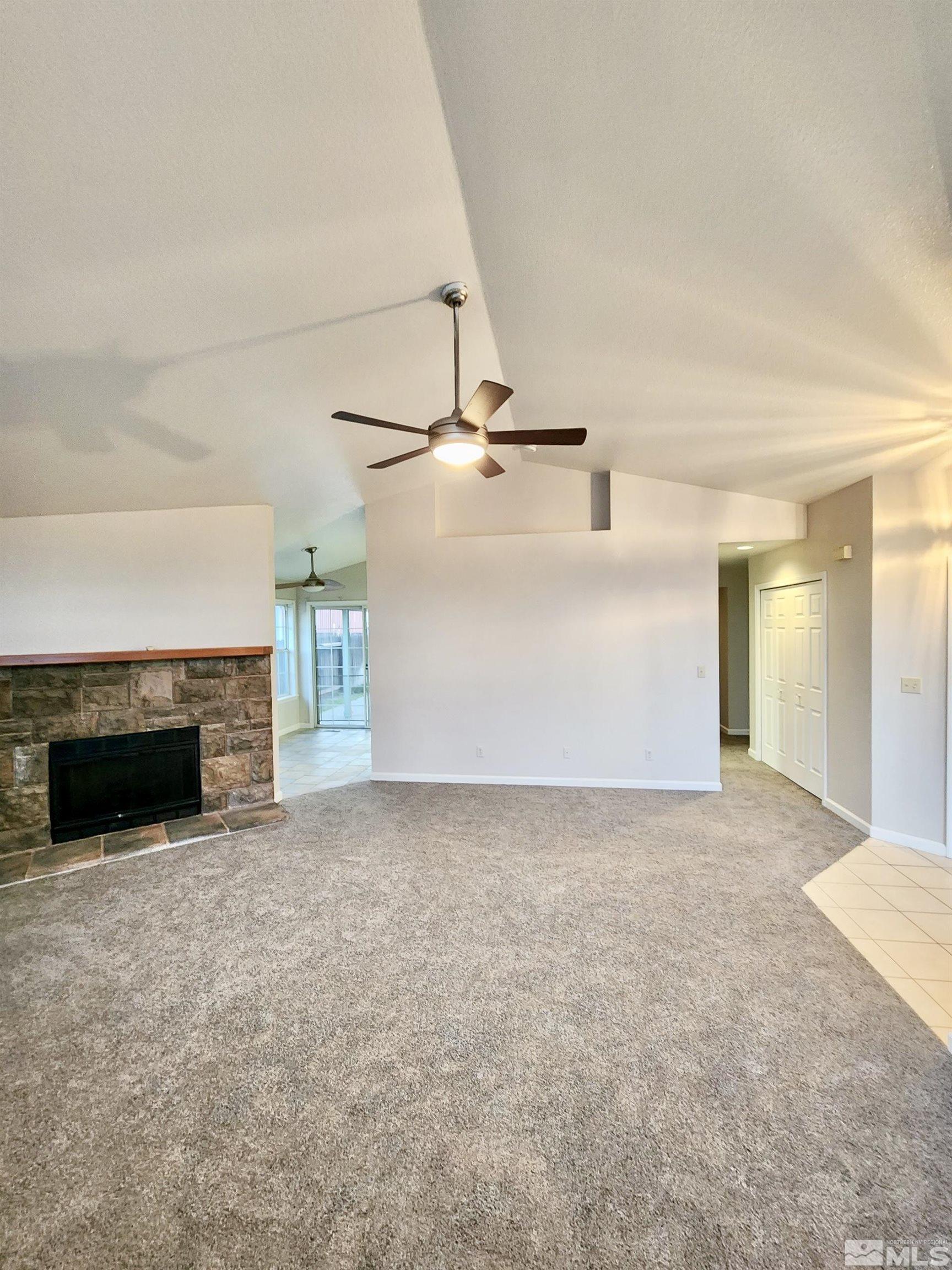 254 Windtree Circle Carson City, NV 89701 - Photo 5 of 23 a view of a livingroom with a fireplace