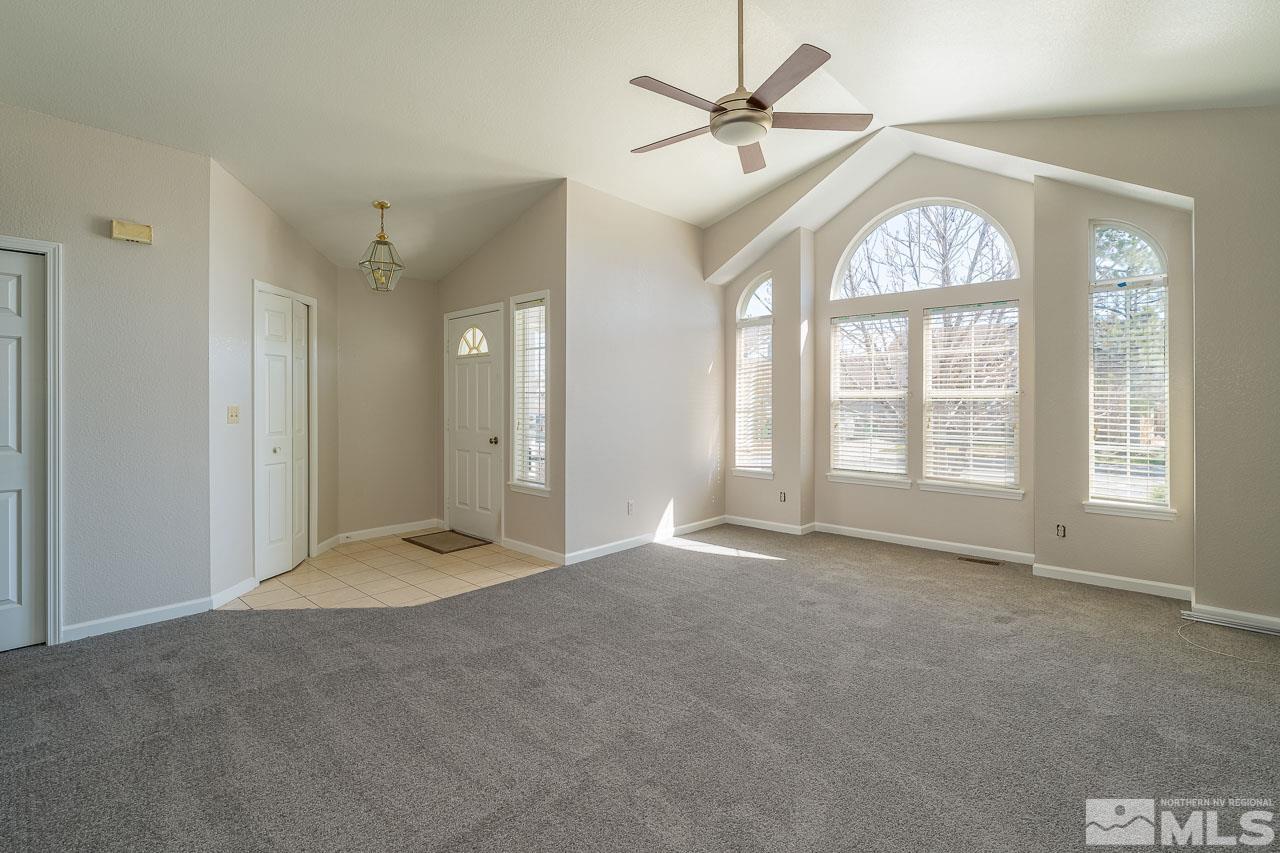 254 Windtree Circle Carson City, NV 89701 - Photo 6 of 23 a view of an empty room with a window