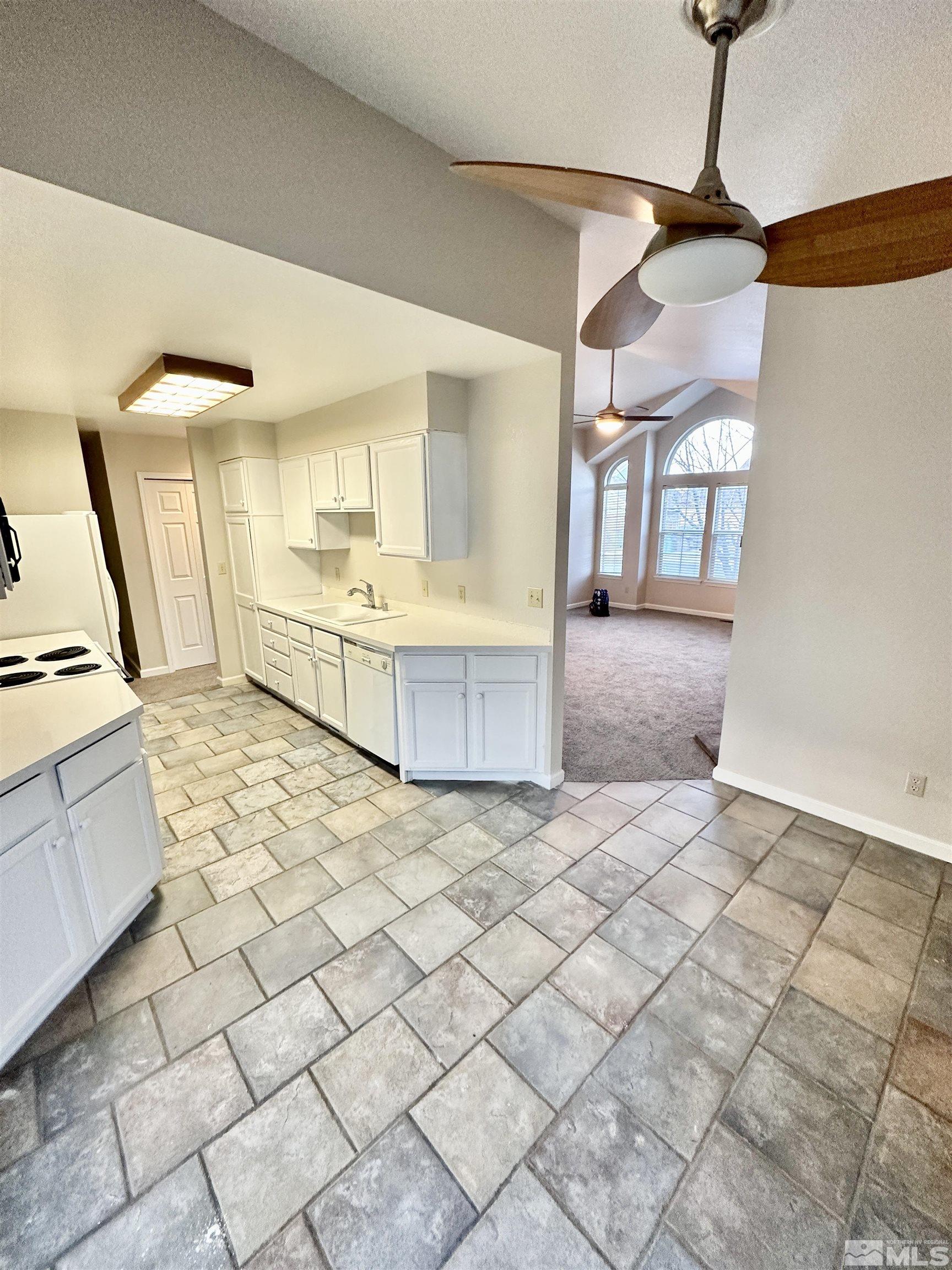 254 Windtree Circle Carson City, NV 89701 - Photo 7 of 23 a large room with cabinets