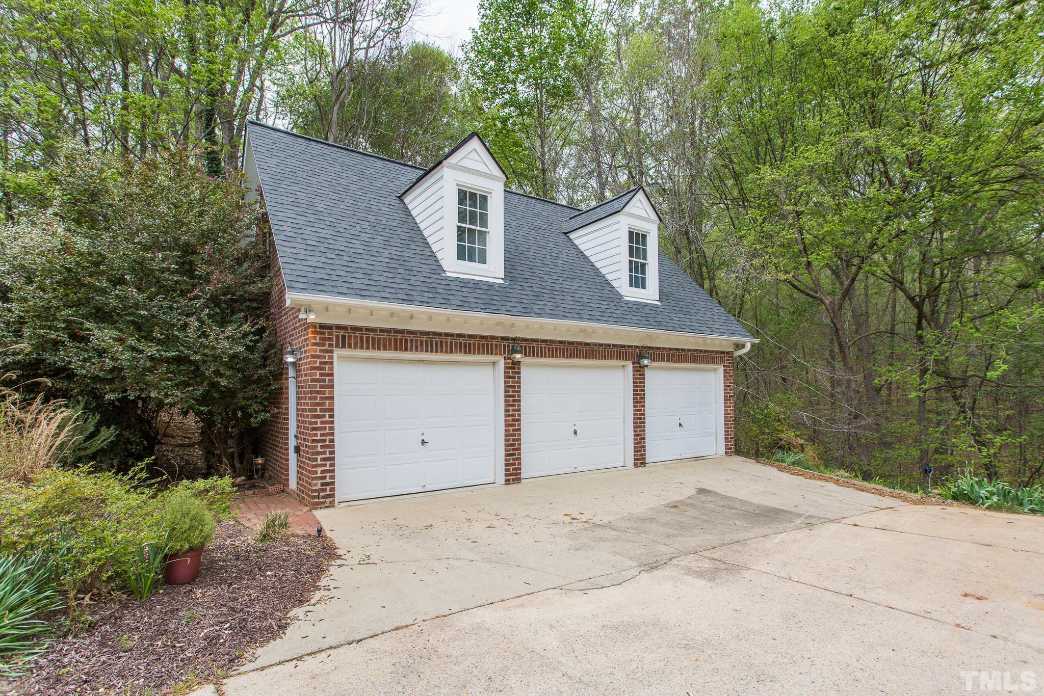 1520 Adams Mountain Road Raleigh, NC 27614 - Photo 4 of 61 front view of a house with a yard