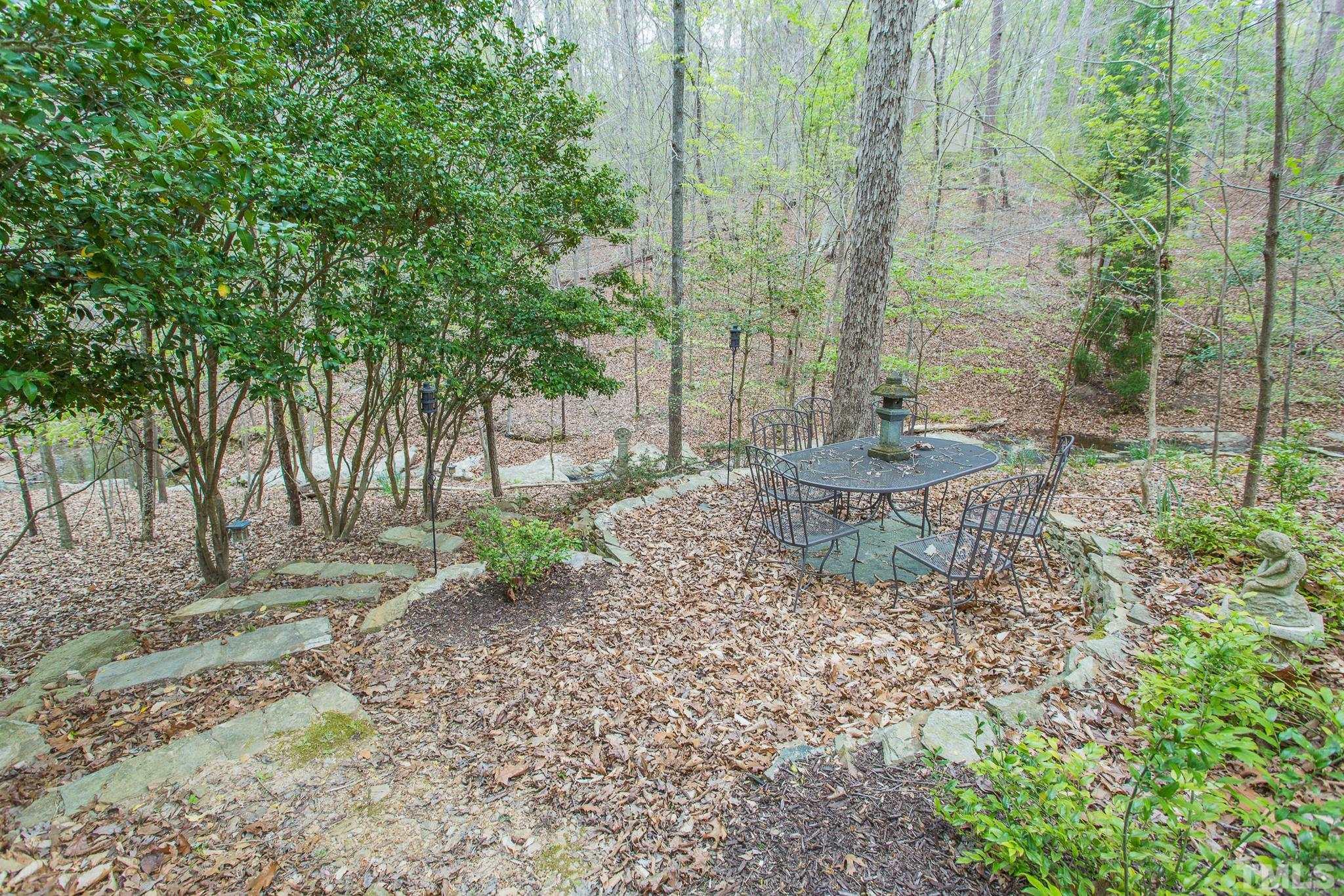 1520 Adams Mountain Road Raleigh, NC 27614 - Photo 60 of 61 a garden view with a seating space
