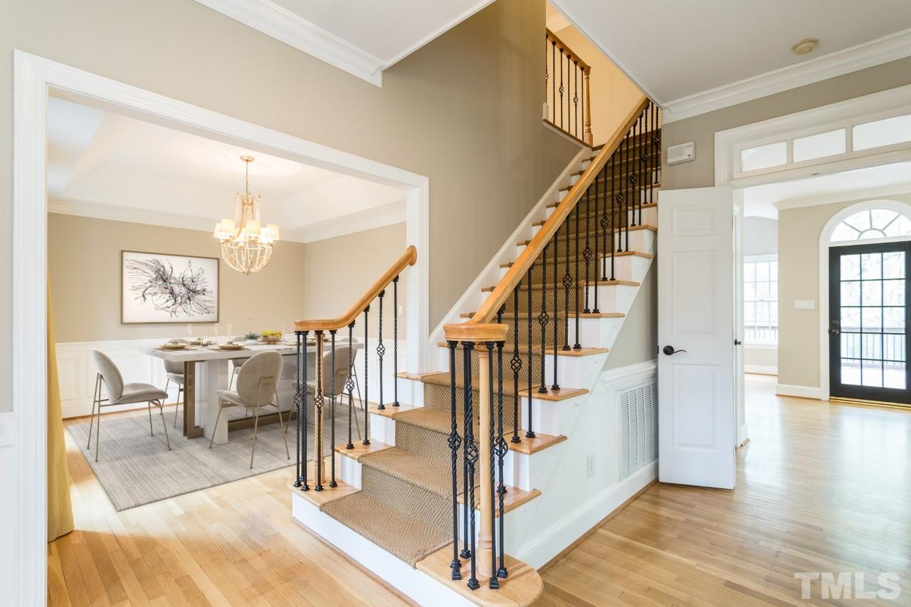 1520 Adams Mountain Road Raleigh, NC 27614 - Photo 8 of 61 a view of entryway and hall with wooden floor