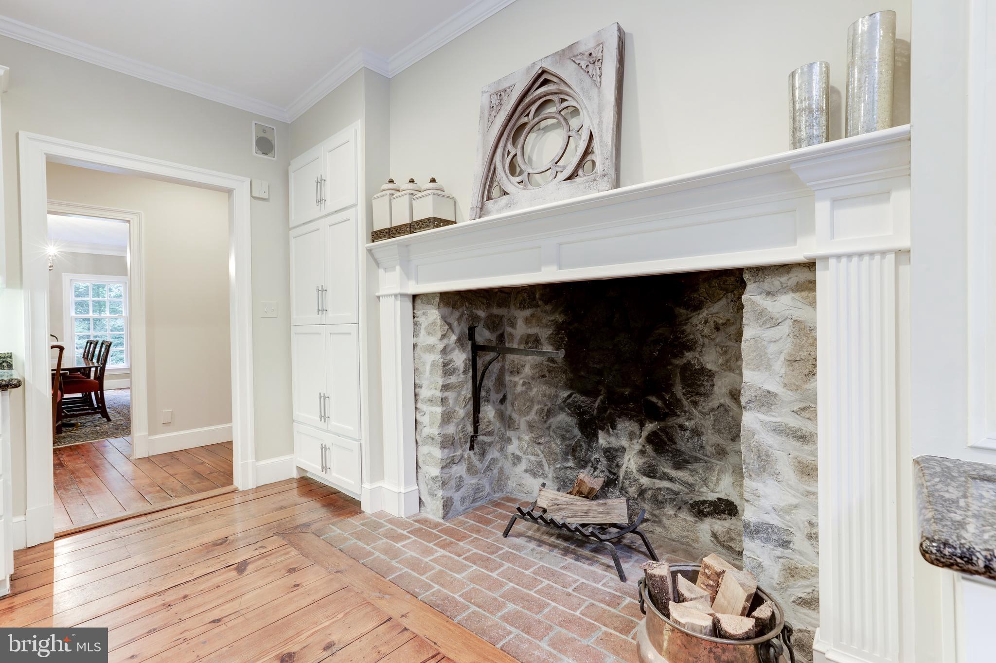 8523 Georgetown Pike McLean, VA 22102 - Photo 30 of 90 Cozy fireplace in gourmet kitchen