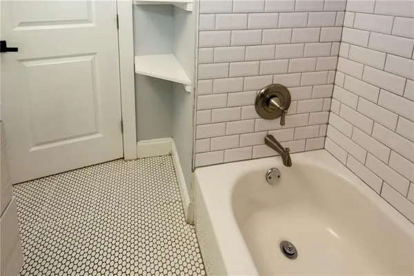 a bathroom with a bathtub