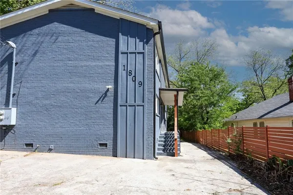 a view of a backyard of the house