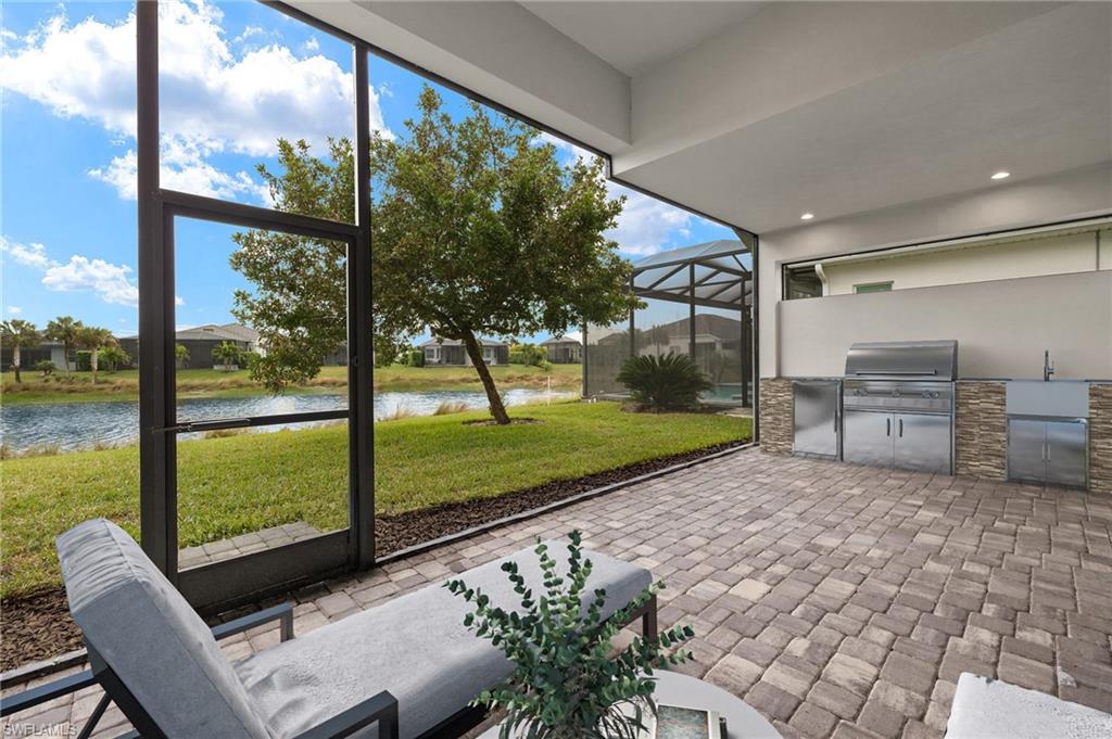 8880 Redonda Drive Naples, FL 34114 - Photo 7 of 41 Rendered Outdoor Kitchen
