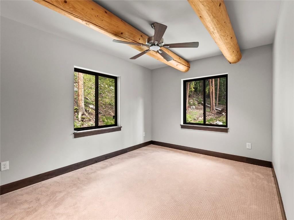 433 97 Circle Blue River, CO 80424 - Photo 25 of 43 an empty room with windows and fan