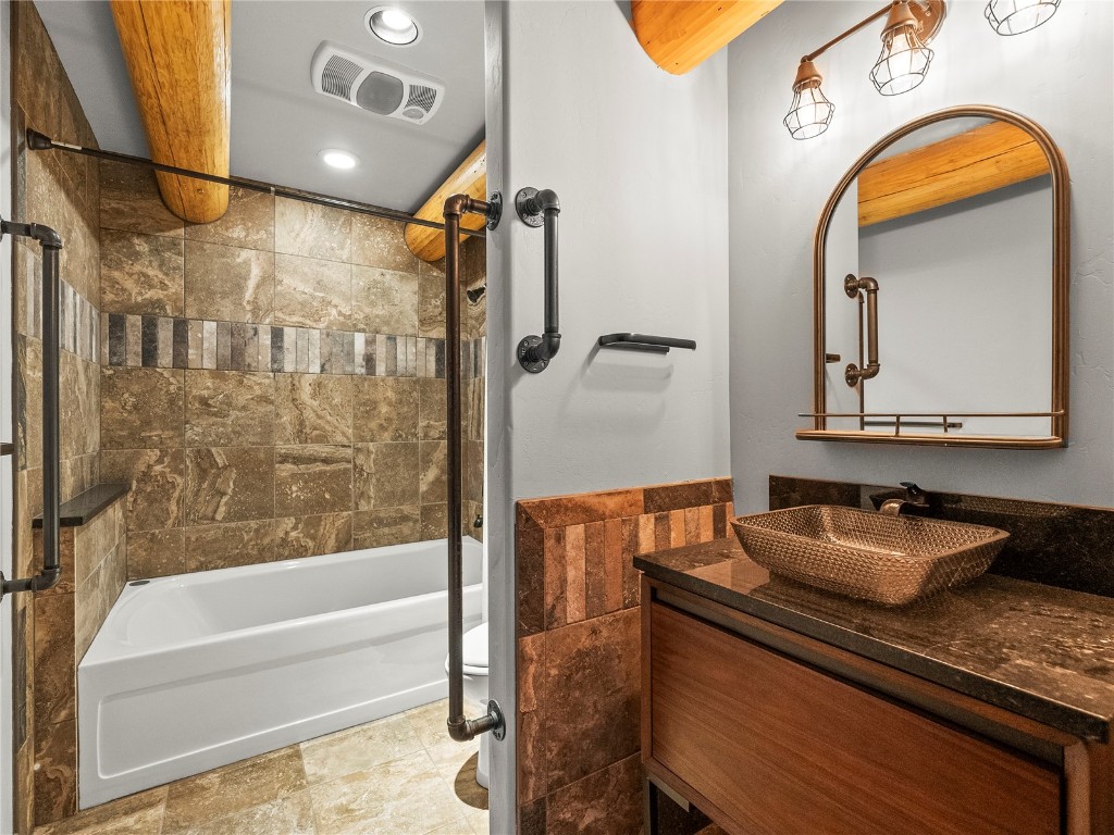 433 97 Circle Blue River, CO 80424 - Photo 29 of 43 a bathroom with a sink and a mirror