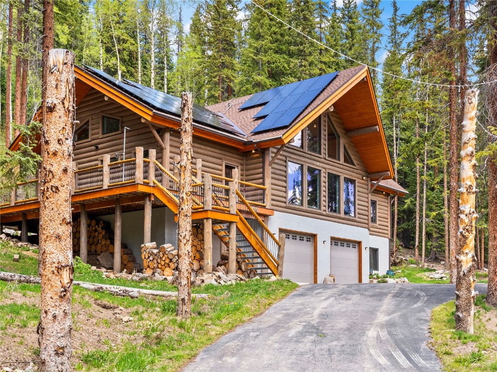 433 97 Circle Blue River, CO 80424 - Photo 3 of 43 a front view of a house with a yard
