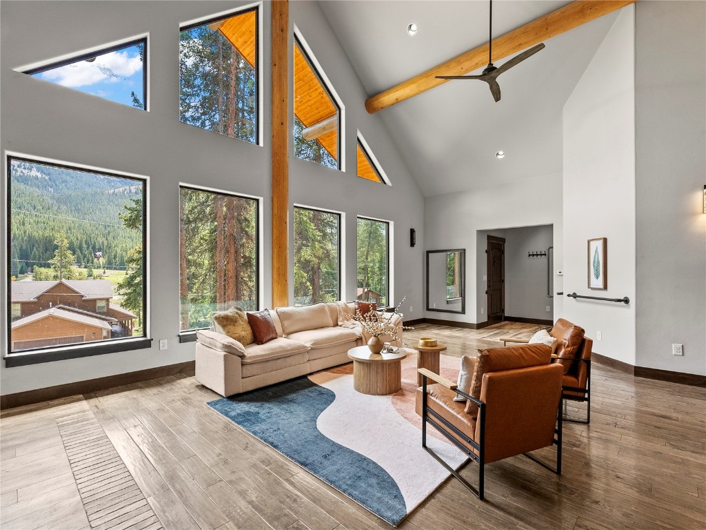 433 97 Circle Blue River, CO 80424 - Photo 8 of 43 a living room with furniture and a large window