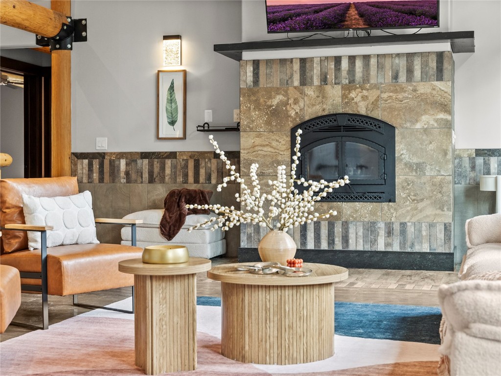 433 97 Circle Blue River, CO 80424 - Photo 9 of 43 a living room with couches and a fireplace