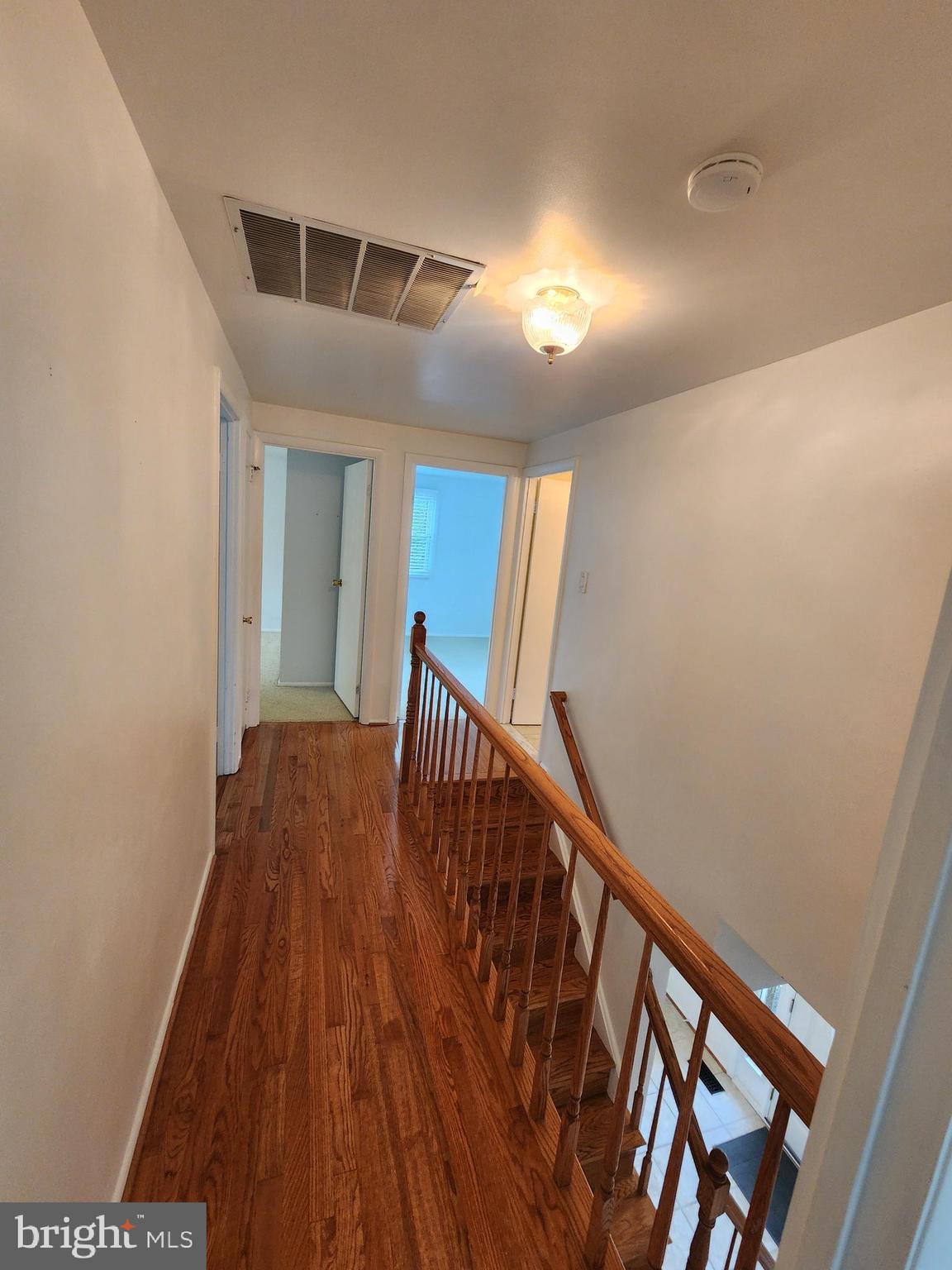 13171 Morning Spring Lane Fairfax, VA 22033 - Photo 24 of 34 a view of an entryway with wooden floor