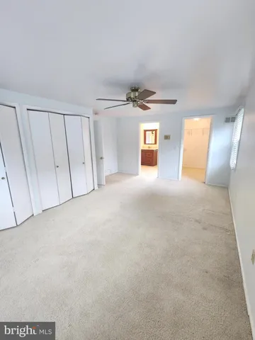 a view of a livingroom with a staircase