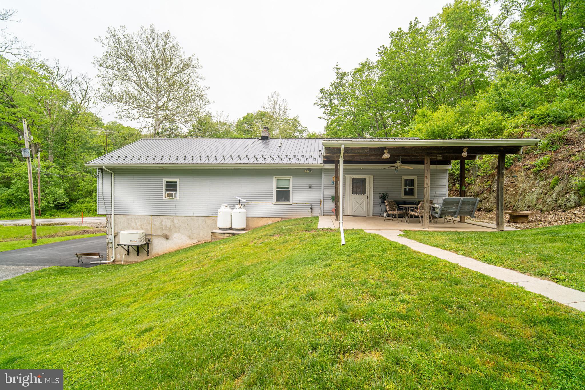 13127 Manor Furnace Road Brogue, PA 17309 - Photo 16 of 78 a view of a house with a yard patio and swimming pool