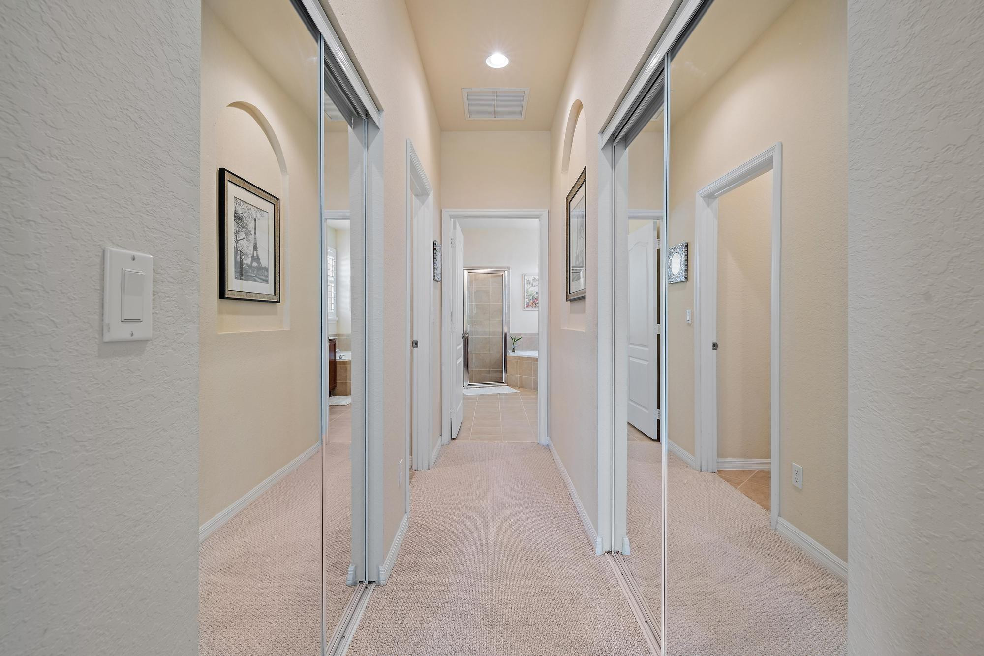 198 Umbrella Place Jupiter, FL 33458 - Photo 17 of 39 a view of a hallway with a white walls