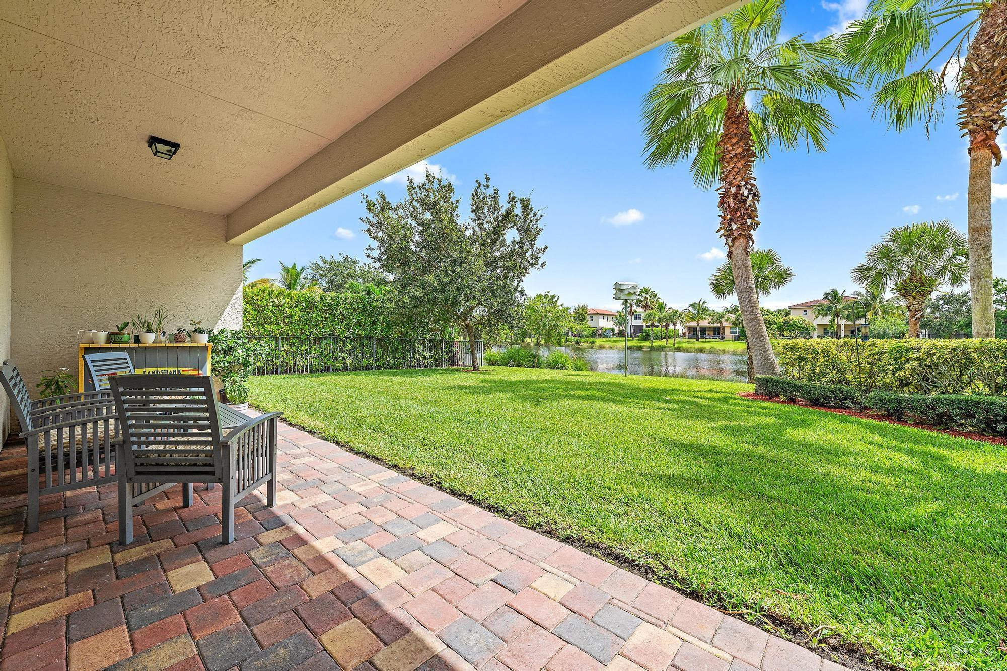 198 Umbrella Place Jupiter, FL 33458 - Photo 25 of 39 a view of a garden with a slide