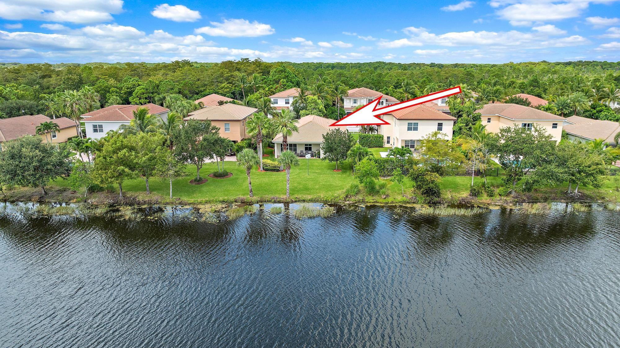 198 Umbrella Place Jupiter, FL 33458 - Photo 29 of 39 a view of a lake with houses