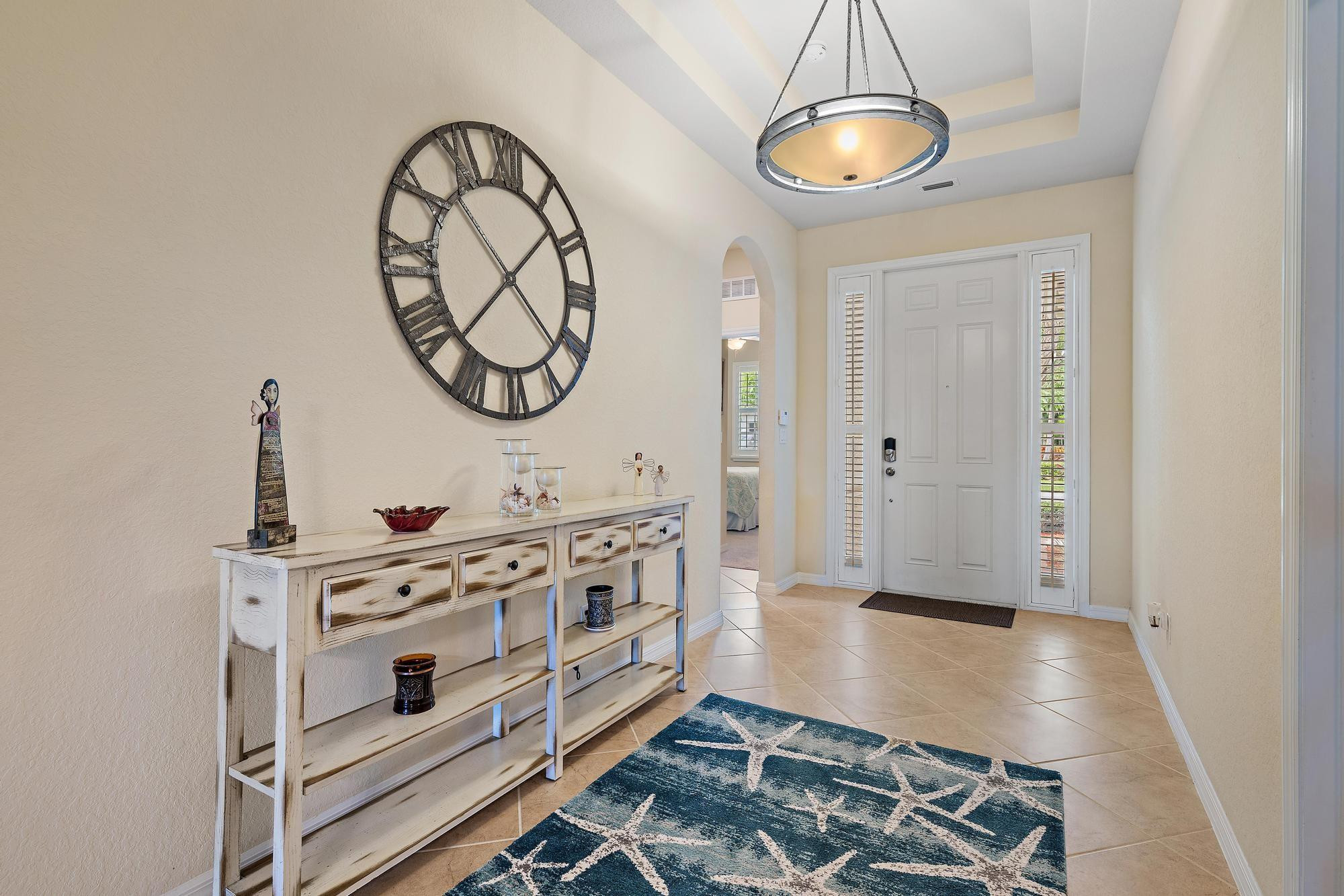 198 Umbrella Place Jupiter, FL 33458 - Photo 3 of 39 a view of a kitchen with stove and cabinets