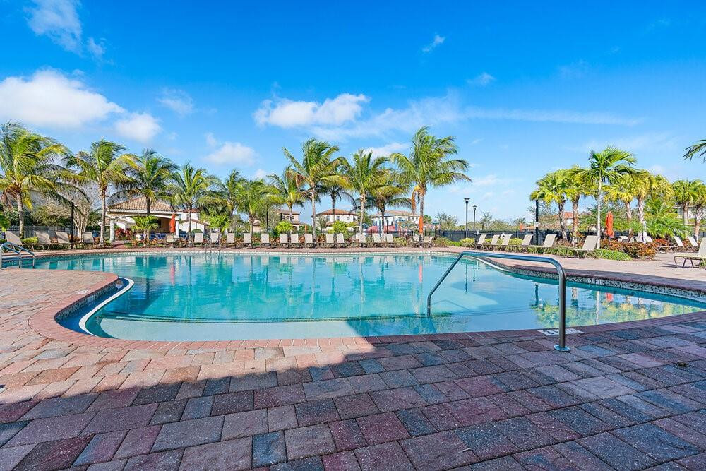 198 Umbrella Place Jupiter, FL 33458 - Photo 36 of 39 a view of a swimming pool with a yard