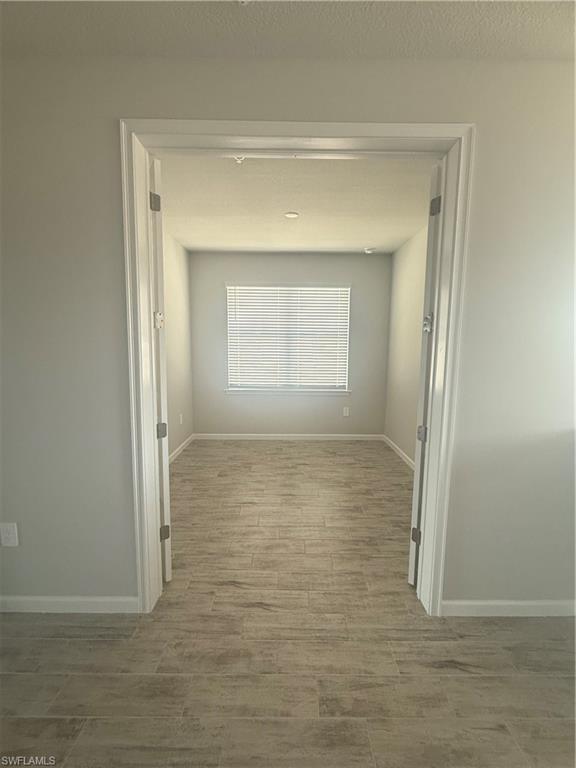 4551 Arboretum Circle, Unit 203 Naples, FL 34112 - Photo 27 of 41 a view of empty room