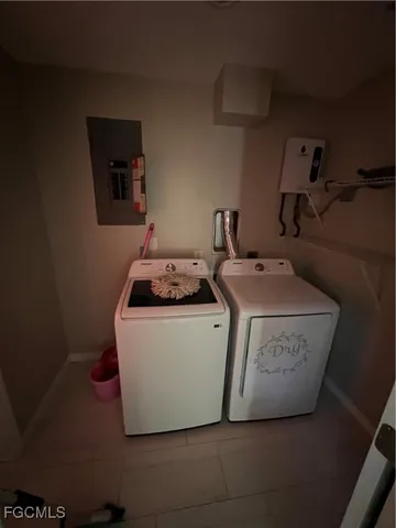 a kitchen with a stove and a refrigerator