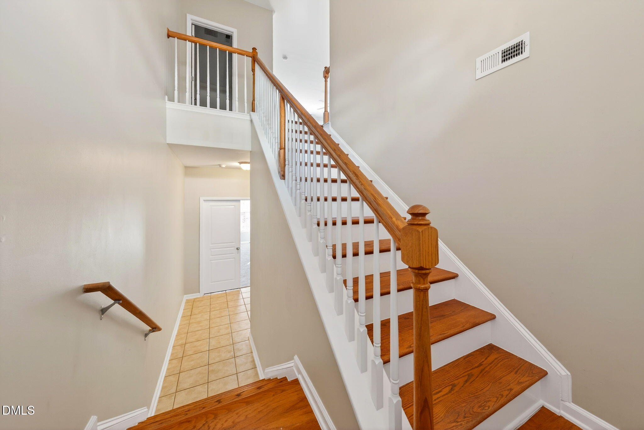 4523 Pale Moss Drive Raleigh, NC 27606 - Photo 15 of 42 a view of entryway with wooden floor