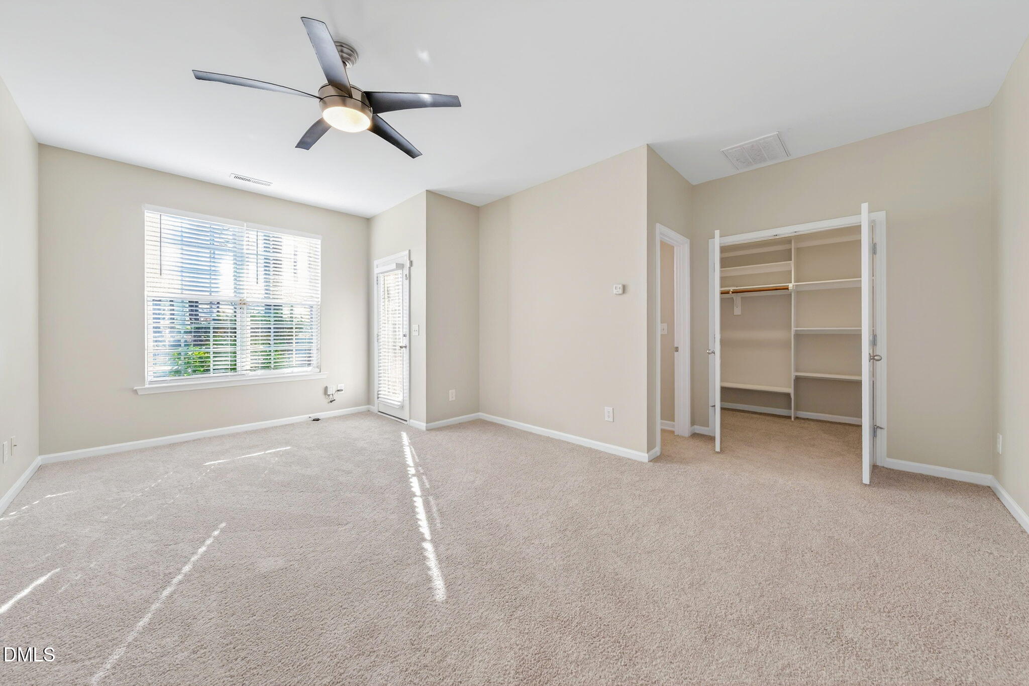 4523 Pale Moss Drive Raleigh, NC 27606 - Photo 18 of 42 a view of an empty room with a window
