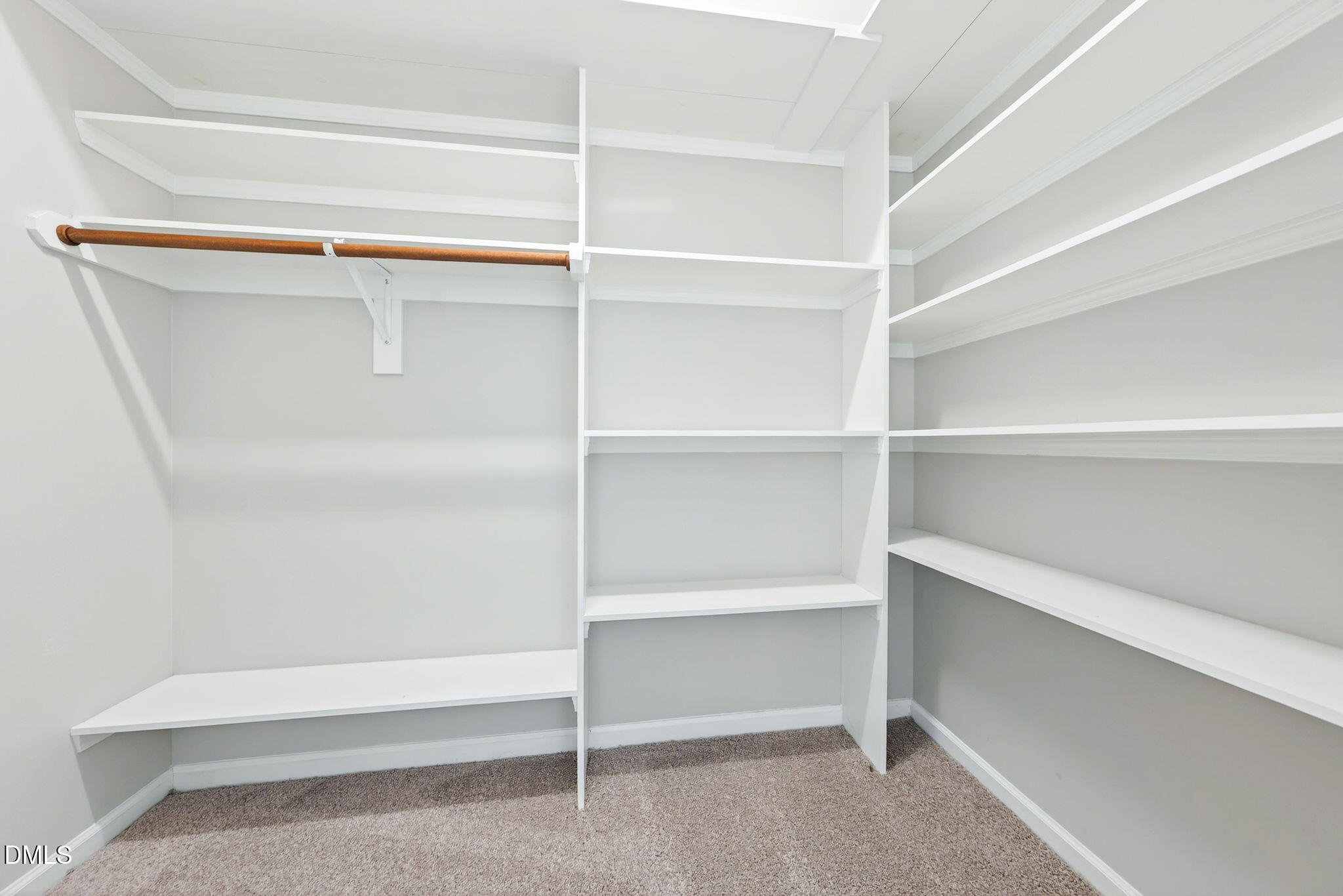 4523 Pale Moss Drive Raleigh, NC 27606 - Photo 19 of 42 a view of an empty walk in closet