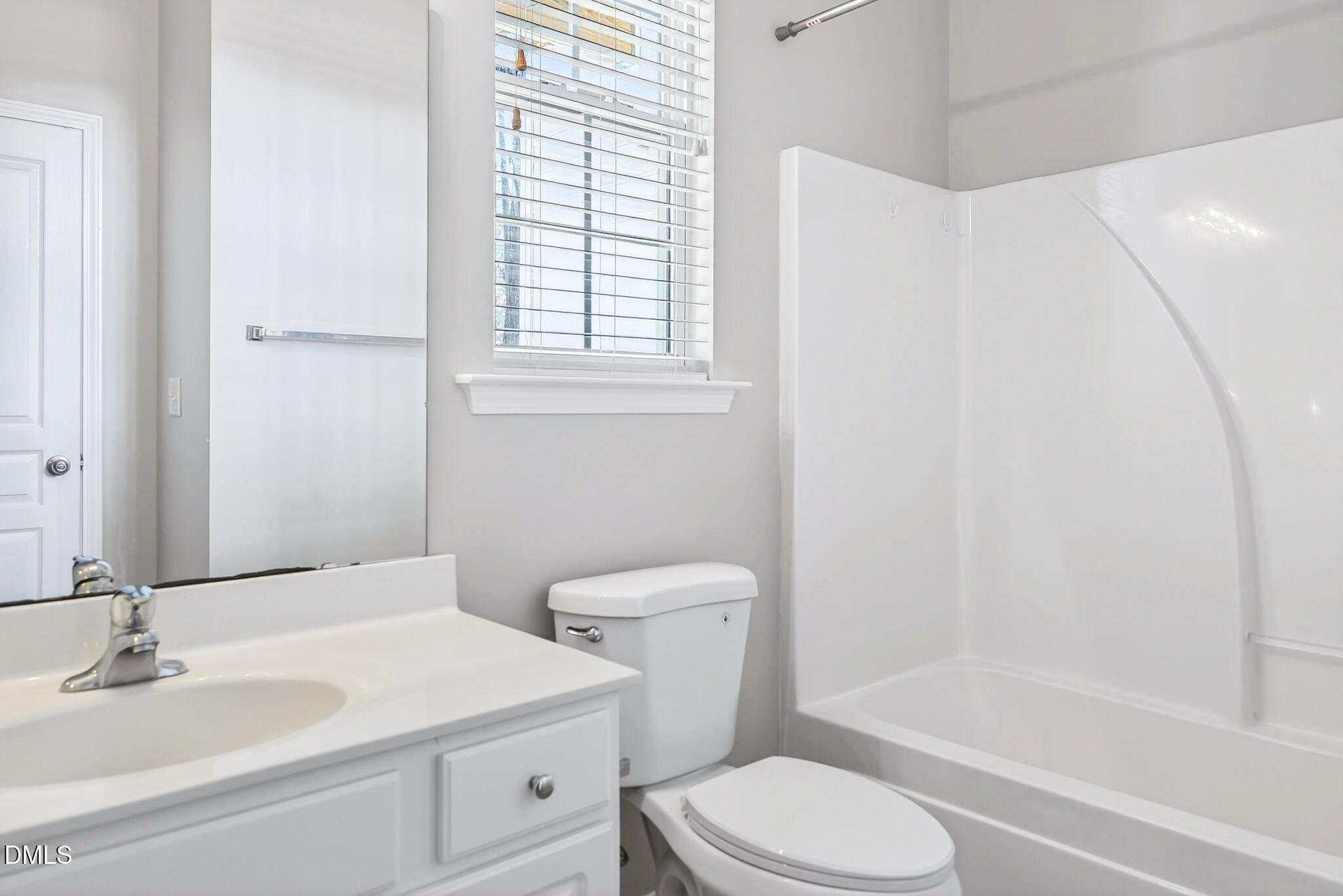 4523 Pale Moss Drive Raleigh, NC 27606 - Photo 20 of 42 a bathroom with a sink toilet and shower