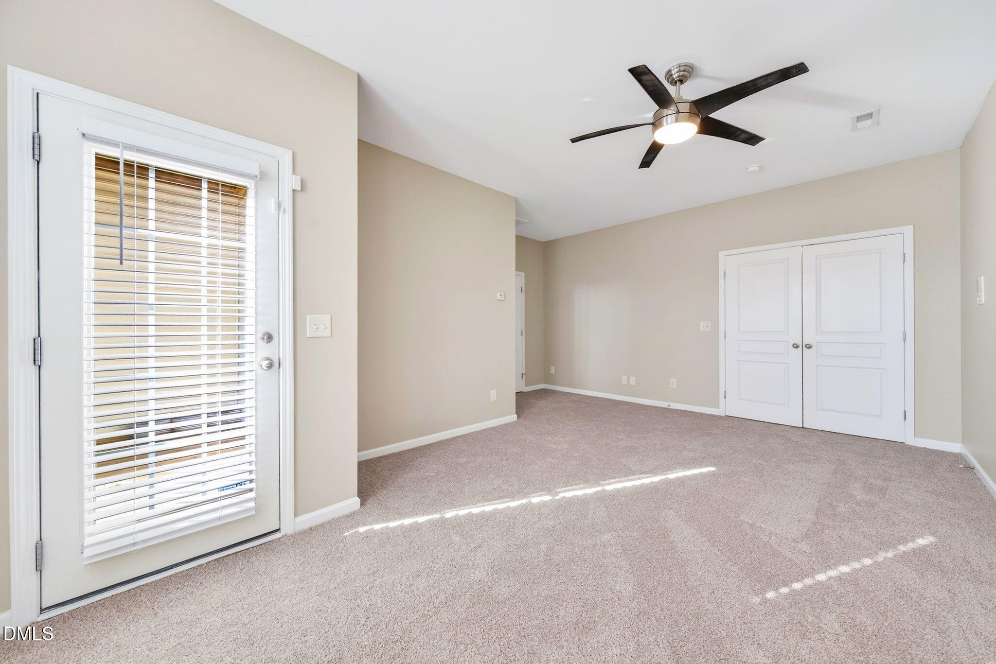 4523 Pale Moss Drive Raleigh, NC 27606 - Photo 21 of 42 a view of a livingroom with a ceiling fan and window