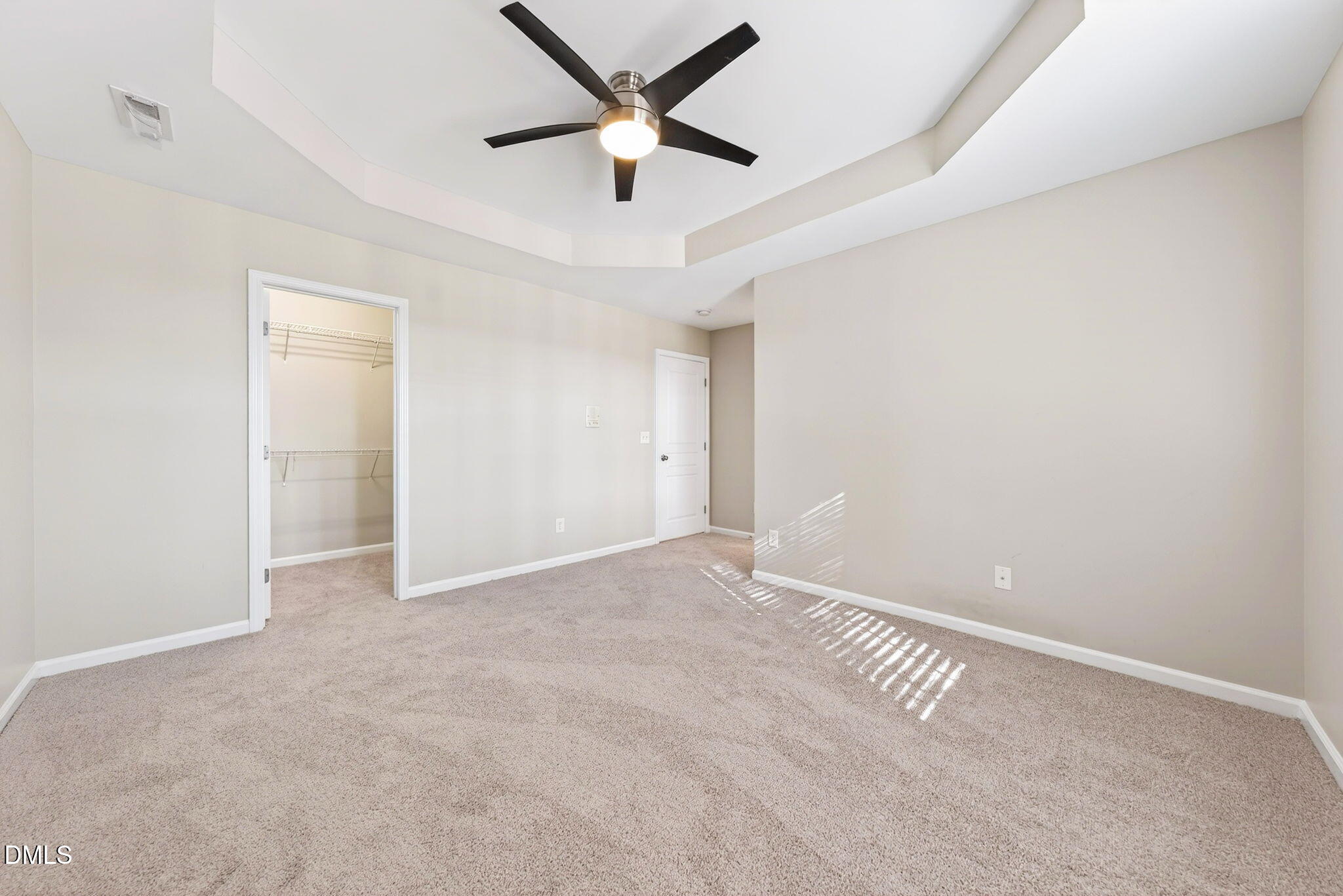 4523 Pale Moss Drive Raleigh, NC 27606 - Photo 35 of 42 an empty room with ceiling fan and window