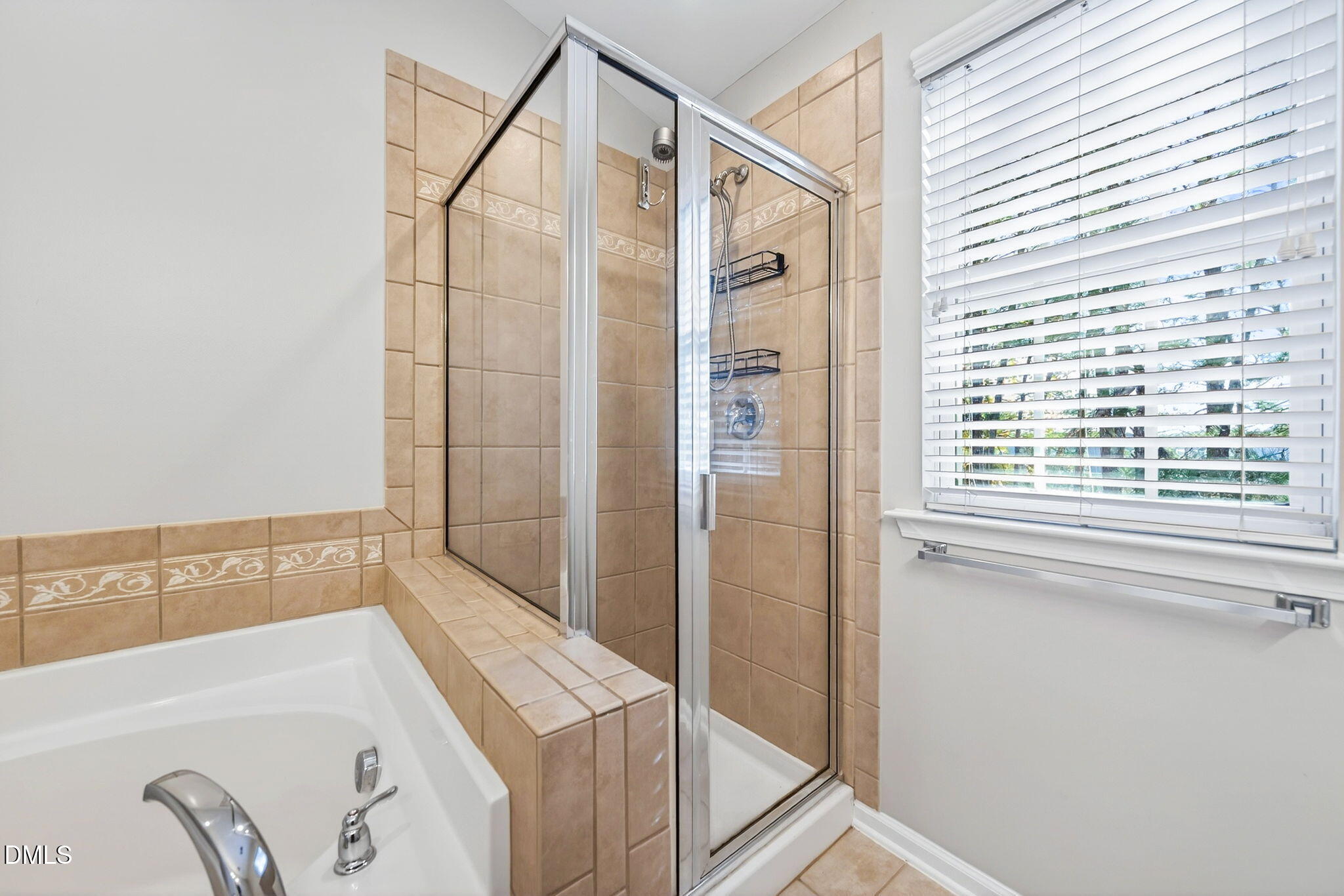 4523 Pale Moss Drive Raleigh, NC 27606 - Photo 37 of 42 a bathroom with a tub and a shower