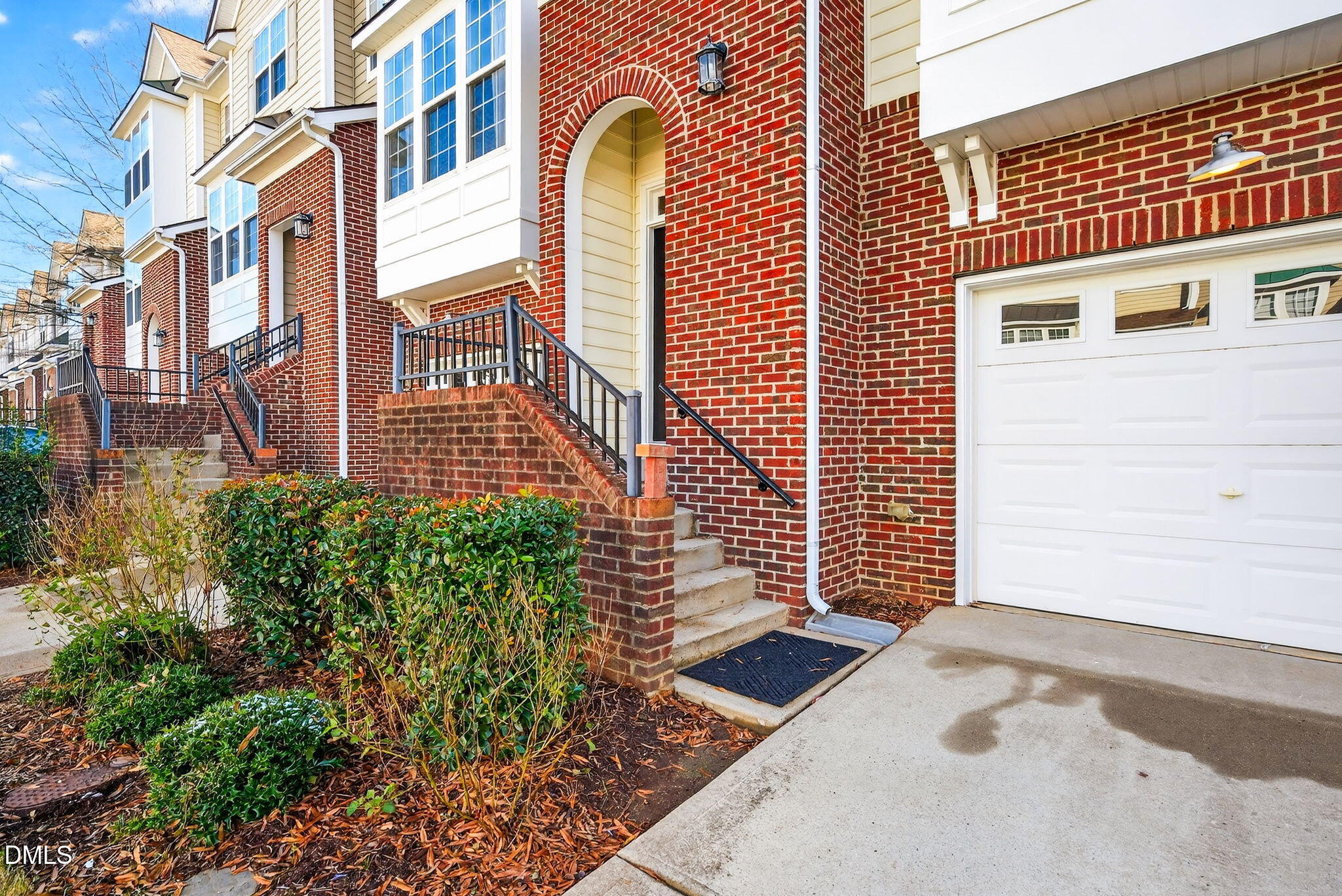 4523 Pale Moss Drive Raleigh, NC 27606 - Photo 41 of 42 a view of a brick building with plants