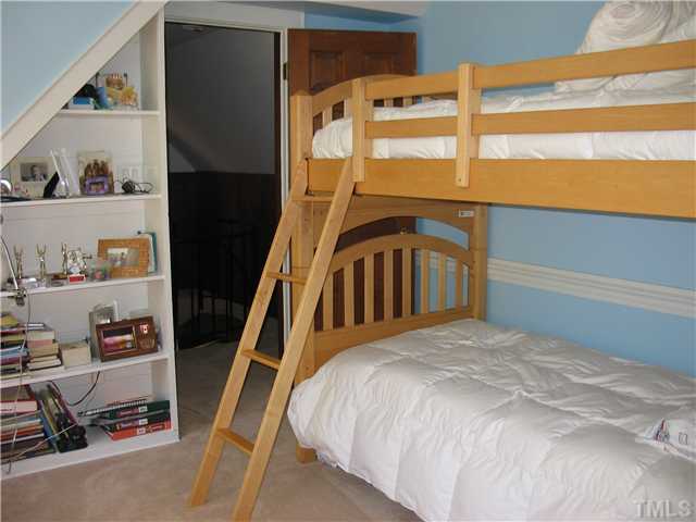613 Lake Boone Trail Raleigh, NC 27608 - Photo 13 of 18 a bedroom with a bed and a window