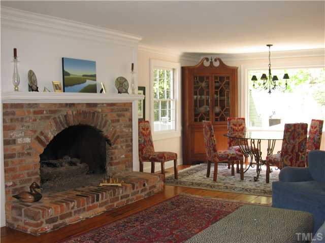 613 Lake Boone Trail Raleigh, NC 27608 - Photo 4 of 18 a living room with furniture and a fireplace