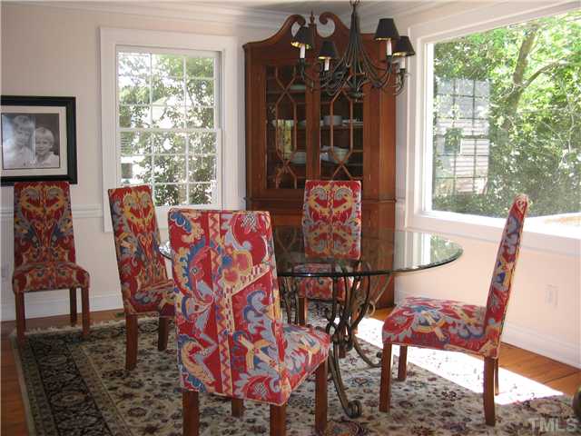 613 Lake Boone Trail Raleigh, NC 27608 - Photo 5 of 18 a view of a dining room with furniture window and outside view