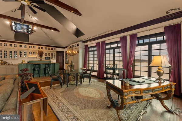 a kitchen with stainless steel appliances granite countertop a stove and a sink